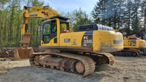 Komatsu excavator landscaping a poerty in British Columbia